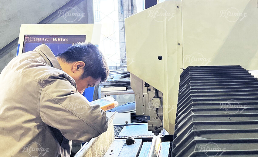 Operator performing trial run of installed machinery